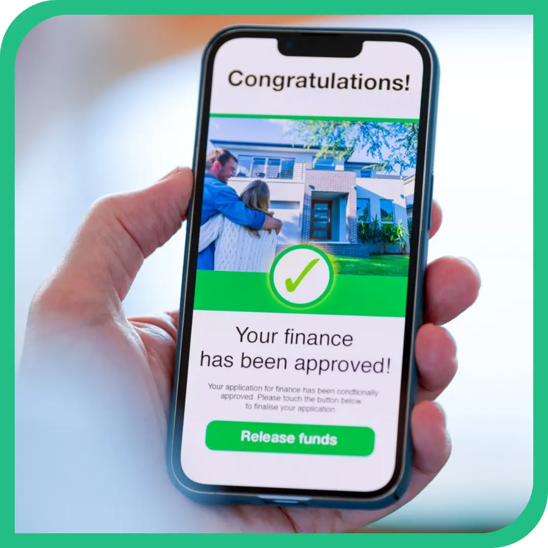 person holding cell phone saying your financing is approved